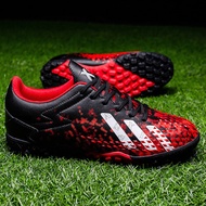 A pair of children's four-season leather football shoes with long studs, wear-resistant soccer shoes