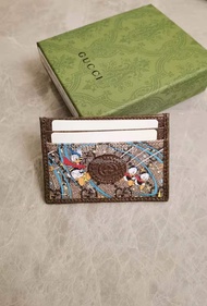 全新🌸 GUCCI Epilogue皮小卡包 唐老鴨系列 size：10-7cm