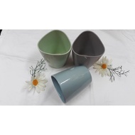 Triangular cylindrical cup with real photo