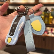 Suitable for Porsche Cinnamon Dog Key Shell Cayenne macan911taycan Paramela 718 Keychain