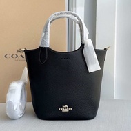 รับประกันแท้💯 Hanna Bucket Bag In Signature Canvas CAF16 CR168