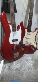 2000 red Squier electric guitar and jazz bass 2000