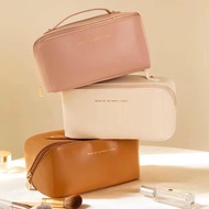 Waterproof cross-zip PU leather cosmetic bag