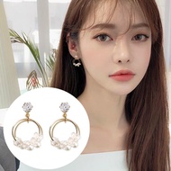 Simple earrings for girls with 2 circles with artificial pearls