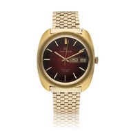 Movado Kingmatic HS 360, a yellow gold plated automatic wristwatch with day and date