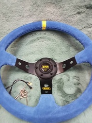 พวงมาลัย OMP หนังกลับสีน้ำเงิน ขิบเหลือง ไม่รวมคอฉะเพราะพวงมาลัย เท่านั้น ก้านสีดำยก 3 นิ้ว ราคาต่อว