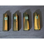 sarung lighter kayu pemetik api cricket