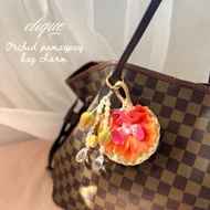 Clique Orchid abacca pamaypay bag charm