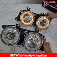 ไฟหน้าแต่ง ไฟหน้า E34 Series BMW Projector วงแหวนไฟเหลืองส้ม มีไฟมุมขายแยก ขายเป็นคู่ NT