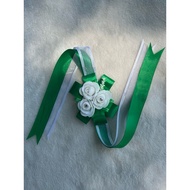 Wrist corsage for bridesmaid green