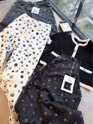 Chanel 黑色針織外套、吊帶裙、牛仔褲套裝