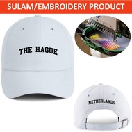 EMBROIDERY SULAM THE HAGUE NETHERLANDS WORDING LOGO BASEBALL 100% POLYESTER CAP ADJUSTABLE STRAP WHI