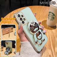 MHKEID Casing Ponsel untuk Samsung A72 5G A71 A70 A70s Case Kartun Doraemon HP ponsel berdiri desain baru Plating lipat Kesing ponsel penuh penutup lensa kamera pelindung Casing