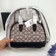 รับประกันแท้💯 งานshop REVEL BAG 24 IN SIGNATURE TEXTILE JACQUARD CG295