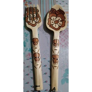 2 figures wooden soon and fork display
