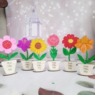 Colored wooden flowers on March 8