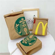 APOD [shining&amp;love] Mcdonald's Starbucks กระเป๋าเป้สะพายหลังกันน้ำกระเป๋าผ้าใบน่ารักกระเป๋านักเรียนหญิงกระเป๋าสะพายข้างผู้ส่งสารสาเหตุ
