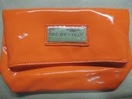 全新*SEE BY CHLOE 橘色/橙色 時尚限量手拿包/化妝包/小物包 100元