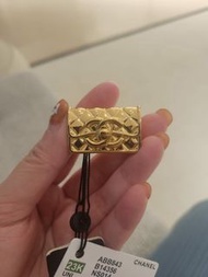 Chanel 23 brooch