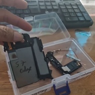 Disassembled s7 edge phone components