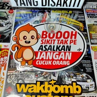 monkey hanging car tag