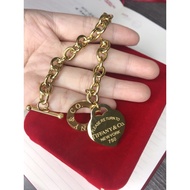 18k/375k Gold TIFF Bracelet