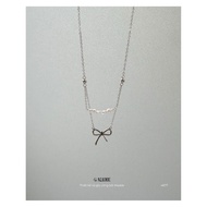 Madde - Bow necklace with pearl stones 4677