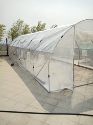 โรงเรือนปลูกพืช เพาะชำ หลังคาโค้ง ปลูกผัก Greenhouse โครงเหล็ก พลาสติกคลุมเป็น PE หนา 140 แกรม รุ่น 