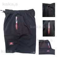 Elastic sports shorts above the knee.