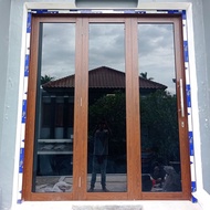 pintu lipat aluminium serat kayu