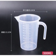 Thick, sturdy mixing measuring cup with capacity of 500ml