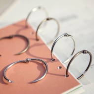 Book hooks, cashcard eyelets