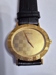 Milus gold watch