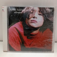#F193-41 CD TERPAKAI. [KYOKO KOIZUMI - AFROPIA] USED CD. #F193-41