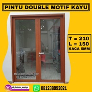 pintu dobel/tarung aluminium motif kayu