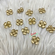 Four-leaf clover button
