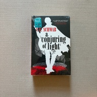 (New & Sealed with minor defects) A Conjuring of Light V.E. Schwab English book