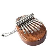 8ที่สำคัญ Kalimba มินิแบบพกพา FingerPiano นิ้วเคาะแป้นพิมพ์กระเป๋าเครื่องดนตรีคริสต์มาสปัจจุบันรงค์ Kalimba