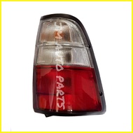 ◱ ◷ § Isuzu Fuego 1997 - 2002 Red White Tail Light Tail Lamp