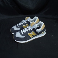 Sepatu new balance 574 outerspace varsity gold original bekas