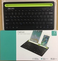 คีย์บอร์ดไร้สาย Fashion Bluetooth keyboard คีย์บอร์ดบลูทูธพร้อมแท่นวางมือถือ แป้นพิมพ์ภาษาไทย สำหรับมือถือทุกระบบ/Windows
