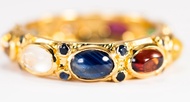 (R04 ชื่อแบบ "กฤษณา") : แหวนทรงพิรอดประดับพลอยนพเก้า ประดับพลอย"ไพลิน" บ่อพลอย กาญจนบุรี (Blue Sapphire)