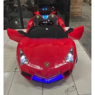 Mainan Anak Mobil Aki Lamborghini BAN FULL KARET JOK KULIT UKURAN SUPER JUMBO  –  Mobil Mainan Aki 2 Kursi 2 Aki - Mobil Mainan Aki Anak Untuk 2 Anak Dengan Remote Control Full Musik Bisa Dinaiki Murah Original