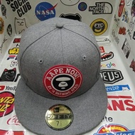 Topi snapback new era x aape silver colour size 7½
