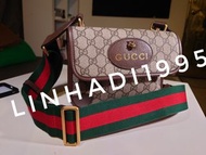 GUCCI.  虎頭雙面側背包