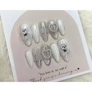 T09- Nailbox white bear nail design