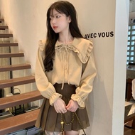 Women's doll collar long sleeve shirt. Women's doll collar long sleeve shirt. Long sleeve shirt