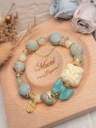 。獅舞青雲。14k金包銅祥獅獻瑞象牙果醒獅壽山石祈福護身設計款