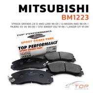 ผ้าเบรค หน้า MITSUBISHI PAJERO 3.5 V6 ปี 90-00 / STRADA GRANDIS 2.8D 4WD L200 ปี96-03 / G-WAGON 4WD ปี 98-03 / LANCER GTI ปี91 - ON / TO 3000GT E52 ปี 91-98 - TOP PERFORMANCE JAPAN BM 1223 - ผ้าเบรก มิตซูบิชิ สตราด้า ปาเจโร่ แลนเซอร์