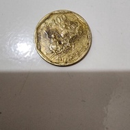 Koin kuno 100 rupiah karapan sapi keluaran tahun 1997